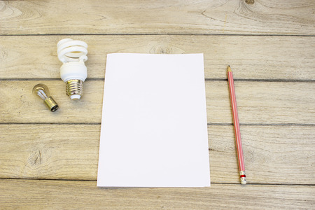 Invented and Help save energy,Broken Bulb on woodの写真素材