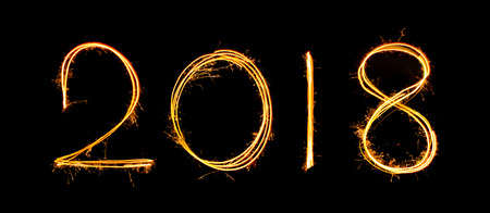 2018 Sparkler Light drawn in numbers for happy new year at night time to celebrate special holiday...