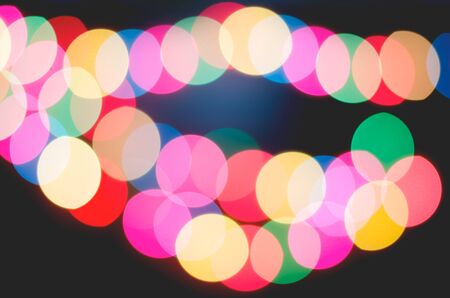 Christmas light bokeh background for Xmas season decoration or new year party celebrationの写真素材