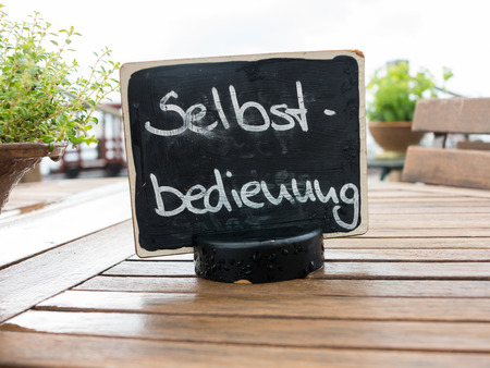 German sign Selbstbedienung translates into self serviceの写真素材
