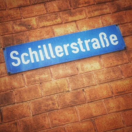 German street sign on brick wallの素材