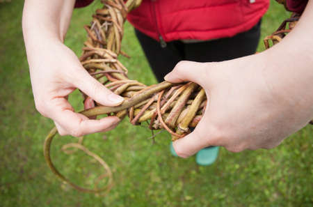 Woman making a wreathの写真素材