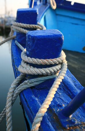 Detail on a fishing boat with ropesの写真素材