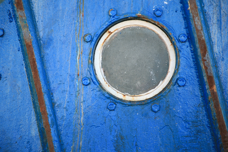 Detail of an old passenger ship with a portholeの写真素材