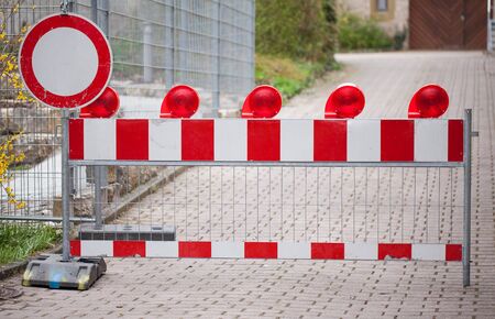 Closed street with construction sign barrierの写真素材