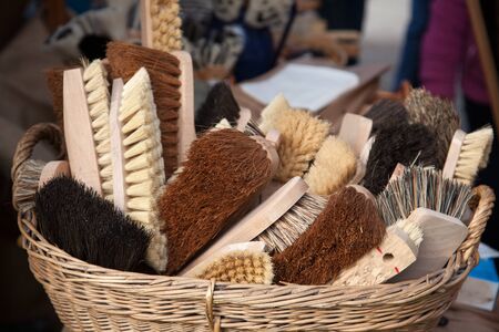 Many traditional handmade brushes in basketの写真素材