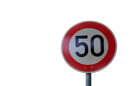 Speed limit traffic sign with white backgroundの写真素材