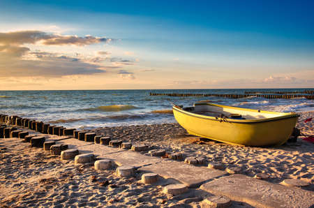 Empty fishing boat on the beachの写真素材