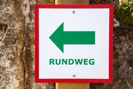 German directional sign Rundweg which translates into English circular trail