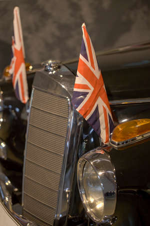 Luxury classic car detail with union jack standard