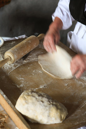 Roll out the dough with the rolling pin