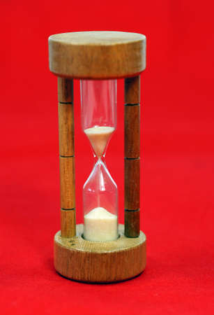 Sand timer with isolated red background