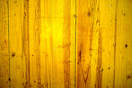 Painted yellow wood panelの写真素材