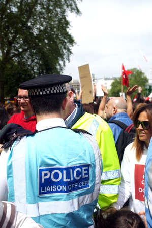 London police escorting a demoのeditorial素材