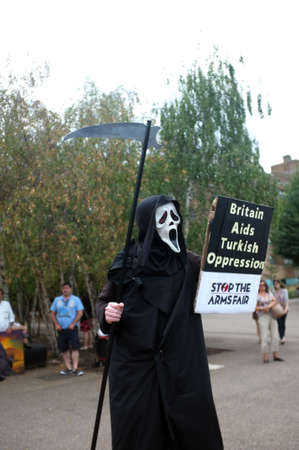 Scream-masked protester during a demoのeditorial素材