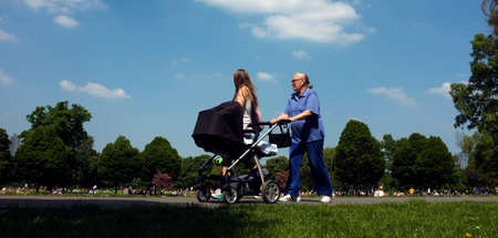 Family walk in one of the many local parks of London のeditorial素材