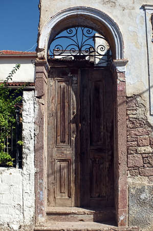 Old rusty door of a houseの写真素材