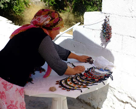 Village woman preparing her local stallのeditorial素材