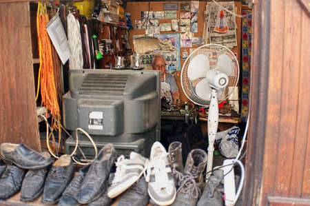Elderly shoe repairmanのeditorial素材