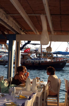 Tourists lunch in fish restaurantのeditorial素材