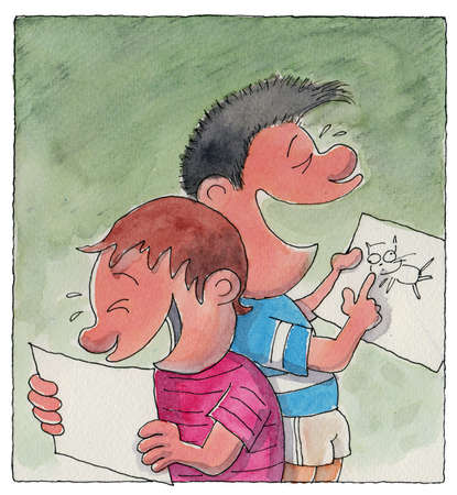 Two boys looking at drawingsの写真素材