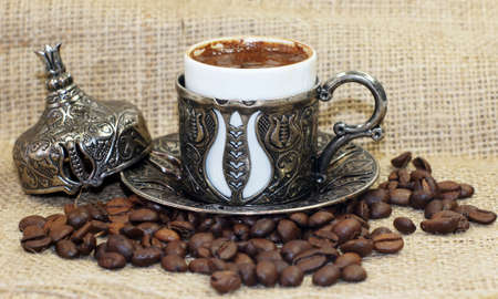 Traditional Turkish coffee with coffee beansの写真素材