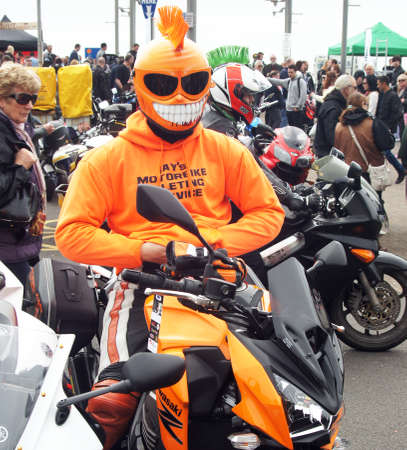 Biker in orange costume