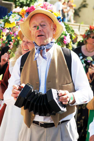 Man in costume play instrument during the carnivalのeditorial素材