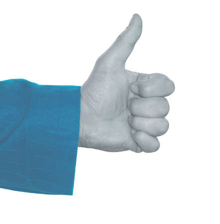 Human hand makes thumbs up in blue effectの写真素材