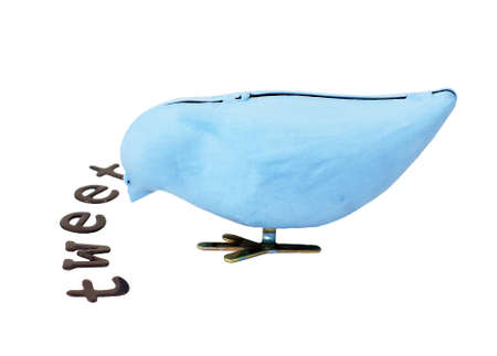Wind up bird eats lettersの写真素材