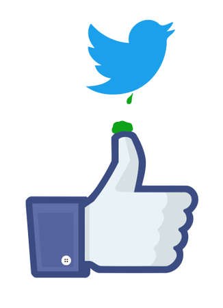 Twitter bird's dropping on Facebook's "like" fingerのeditorial素材
