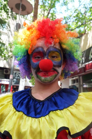 Female seller in clown dressのeditorial素材