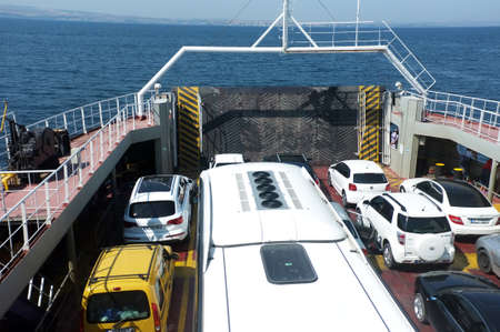 Cars waiting to leave the ferryboatのeditorial素材