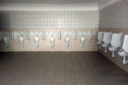 Indoor scenery of a public toilet with urinals
