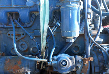 Blue painted boat engine with valves and tubesの写真素材