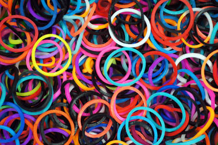 Close up shot of many colourful rubber ringsの写真素材