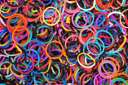 Close up shot of many colourful rubber ringsの写真素材
