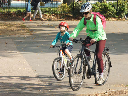 Mother and son cycling in the parkのeditorial素材