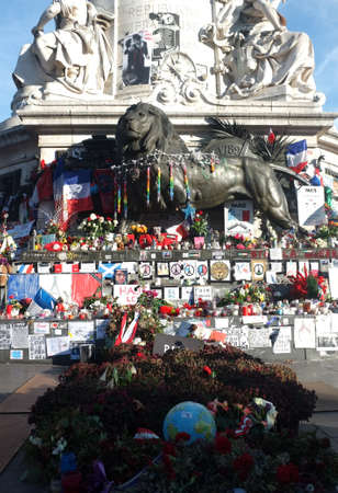People left memorial items around the statue of Palace de la Republiqueのeditorial素材