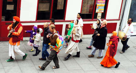 Hare Krishna followers walking in a London Streetのeditorial素材