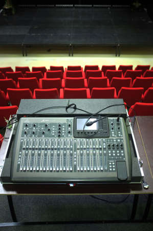 Old sound mixer in a small concert hallの写真素材