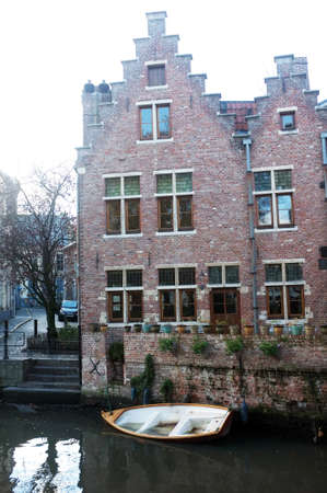 House by the river in the city of Ghentの写真素材
