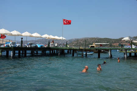 Family enjoys water during summer holiday near jetty in Marmaris, Turkeyのeditorial素材