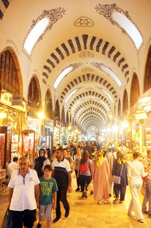 People shop inside the Grand Bazaar, one of the famous tourist attractions in Istanbul,Turkey