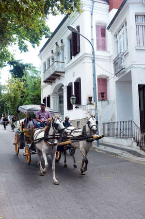 Tourists travel with horse cart in Buyukada, biggest island near Istanbul, Turkeyのeditorial素材