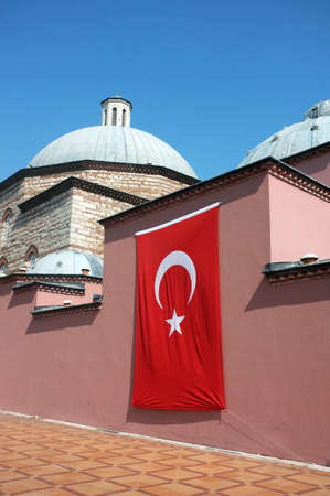 Historical building with Turkish flag in Istanbul, Turkeyの写真素材