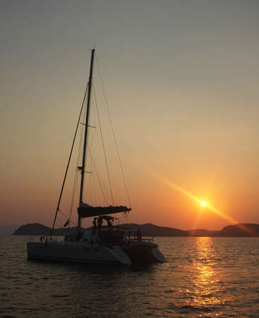 Yacht  silhouette at dawn in Marmaris, Turkeyの写真素材