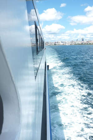 View from the side of moving boat on water in Marmara Seaの写真素材
