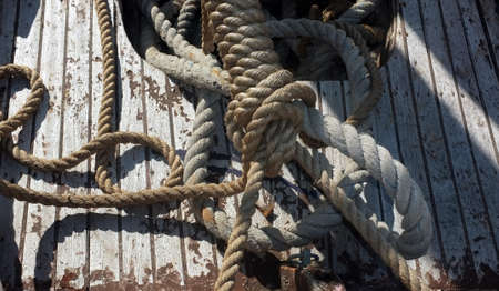 Ropes on wrecked boat as background imageの写真素材
