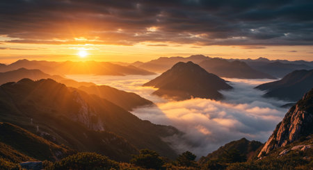 Mountain landscape at sunrise in the clouds. Beautiful natural scenery.の素材